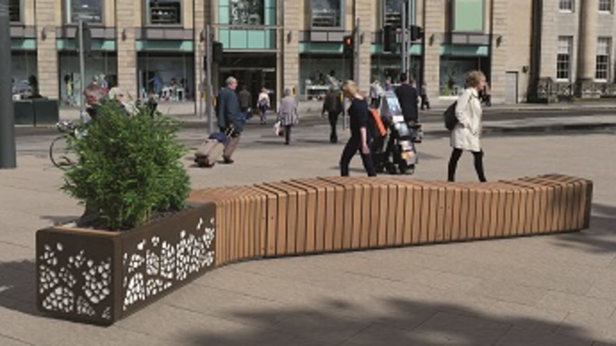 Natural Elements Bench Convex Module in front of shopping centre