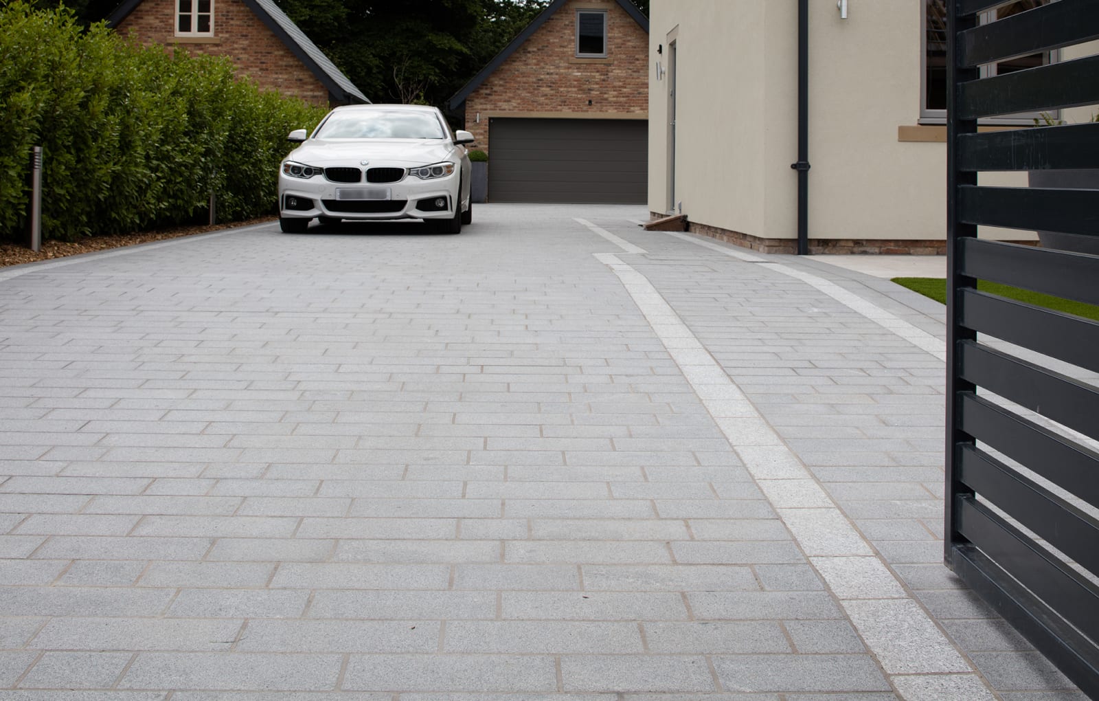 Sawn Granite Setts in Dark and Light driveway