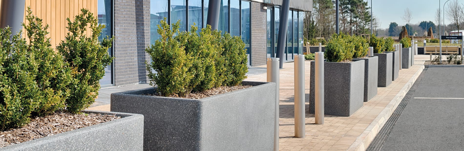 Grey Rhinoguard concrete palnters with Geo bollards