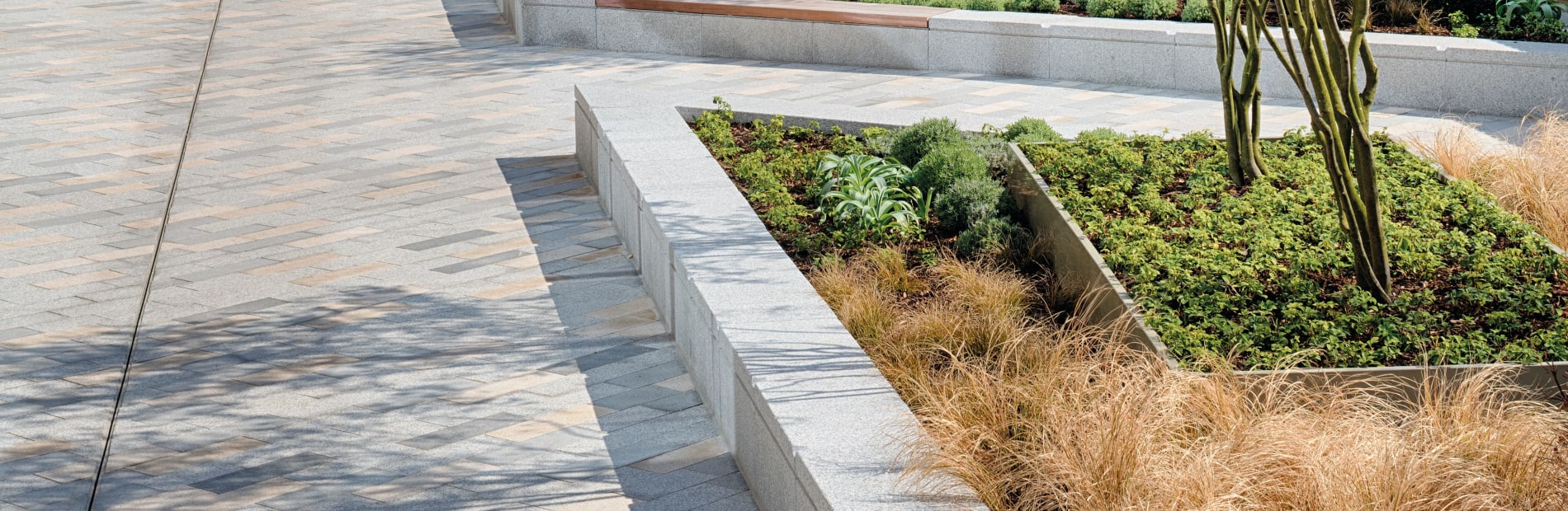 Bespoke seating and planter combination for outside business building