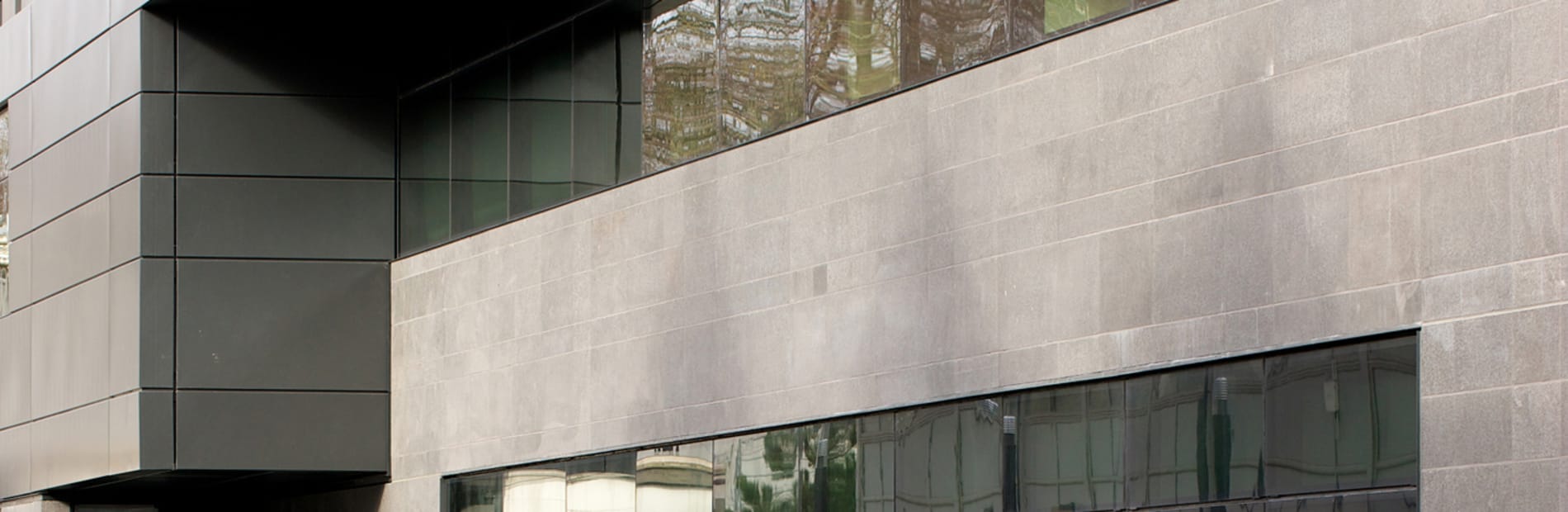 bollards outside the entrance of a commercial building