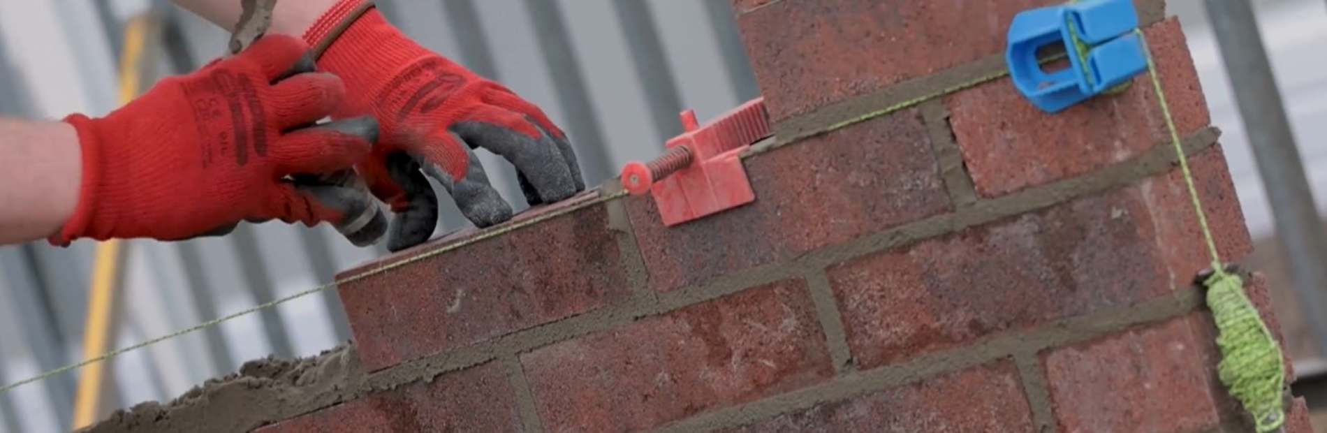 mortar being used on a wall