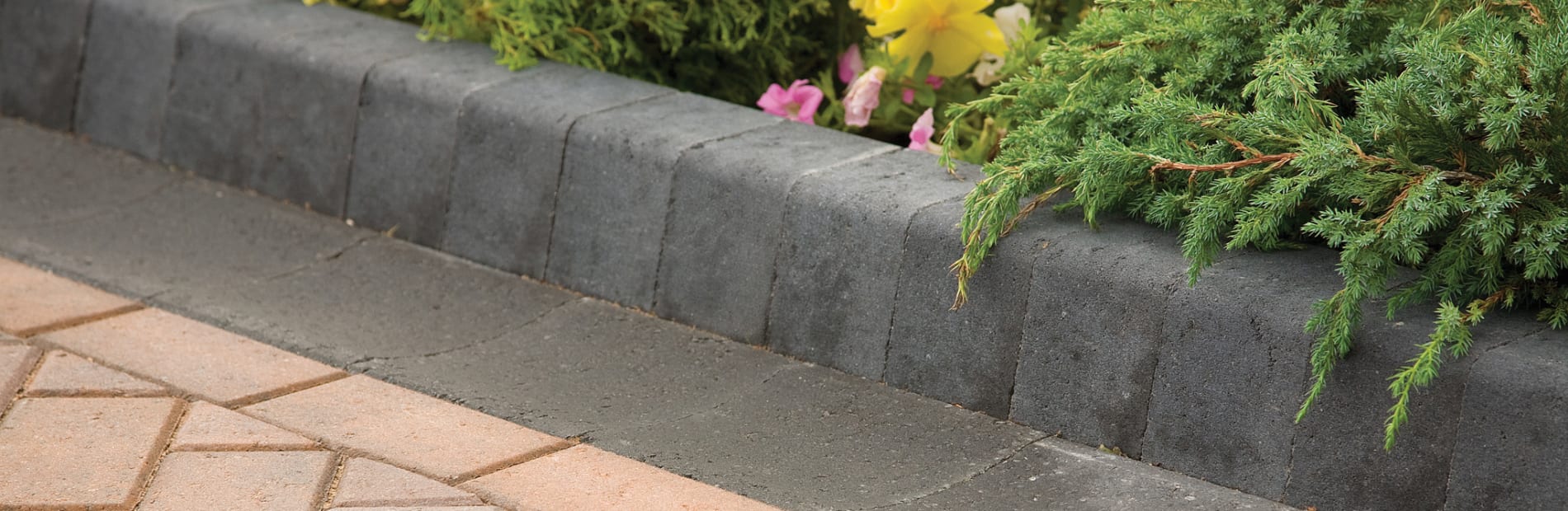 Coloured kerbs including grey kerb stones Marshalls