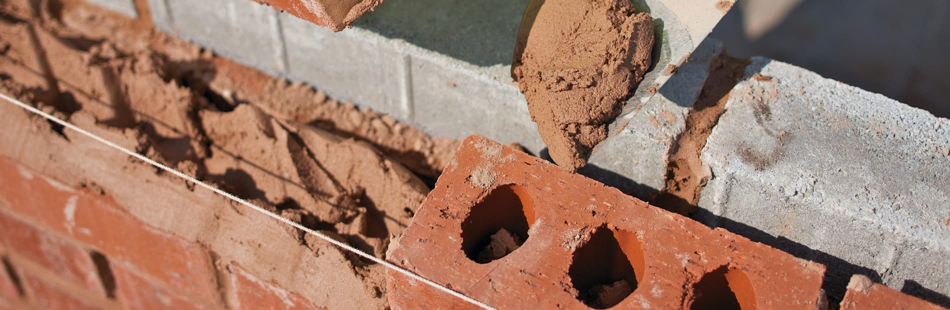 Mortar being used on bricks
