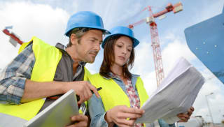 Man and woman on construction site