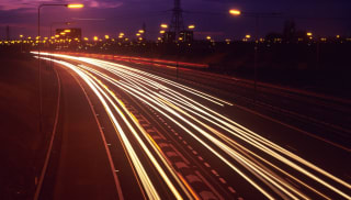 A timelapse of a busy motorway at night.