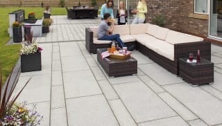 marshalls granite eclipse garden paving laid in a patio area.