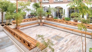 Marshalls London Design Space courtyard featuring benches and plants