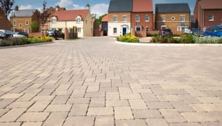 Can permeable paving be installed near a building?