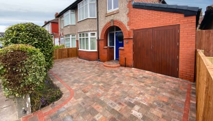 A stylish block paving driveway design for a small front garden