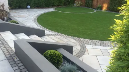 Grey paving used in a garden patio area