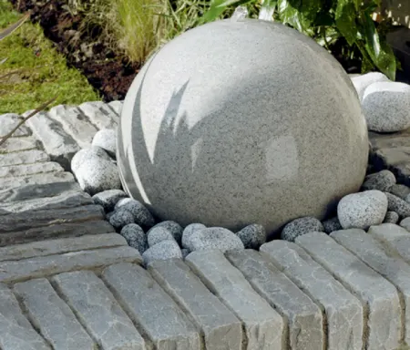 Grey spherical water feature