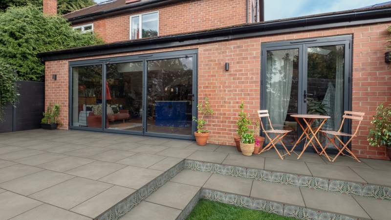 Marshalls Arrento Core garden paving in Silver Grey laid in a garden patio setting.