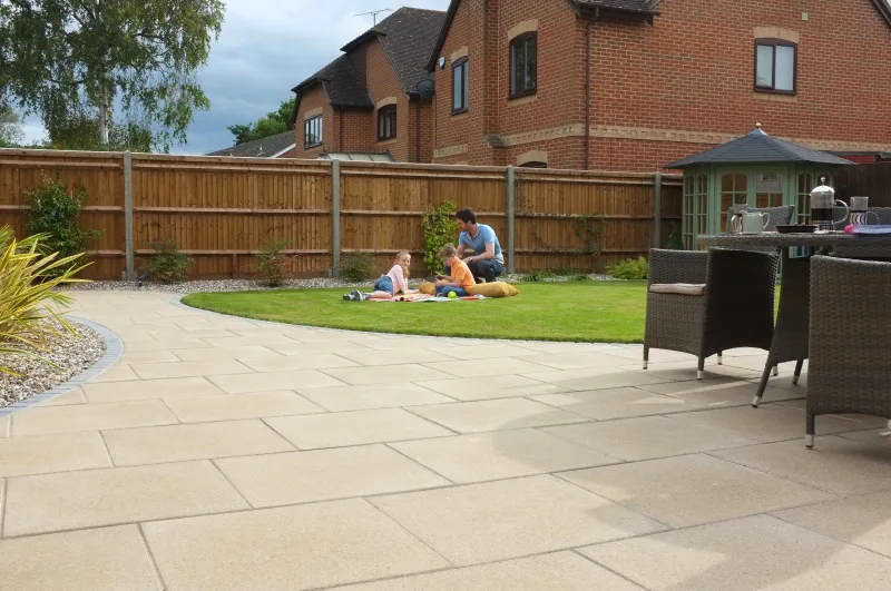 Natural coloured patio with bright plant pots