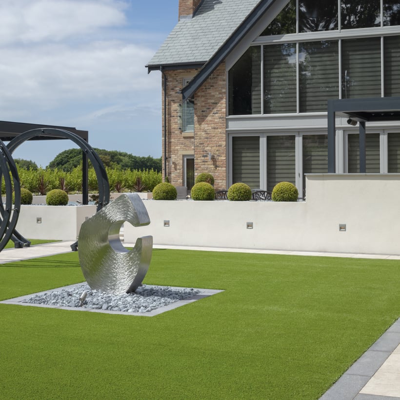 A Minimalist Contemporary Garden With Sculptures And An Outdoor Kitchen Marshalls