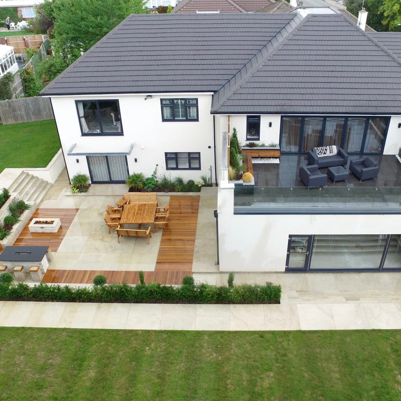 Contemporary Outdoor Space With Water Features Fire Pit And Kitchen Area Marshalls