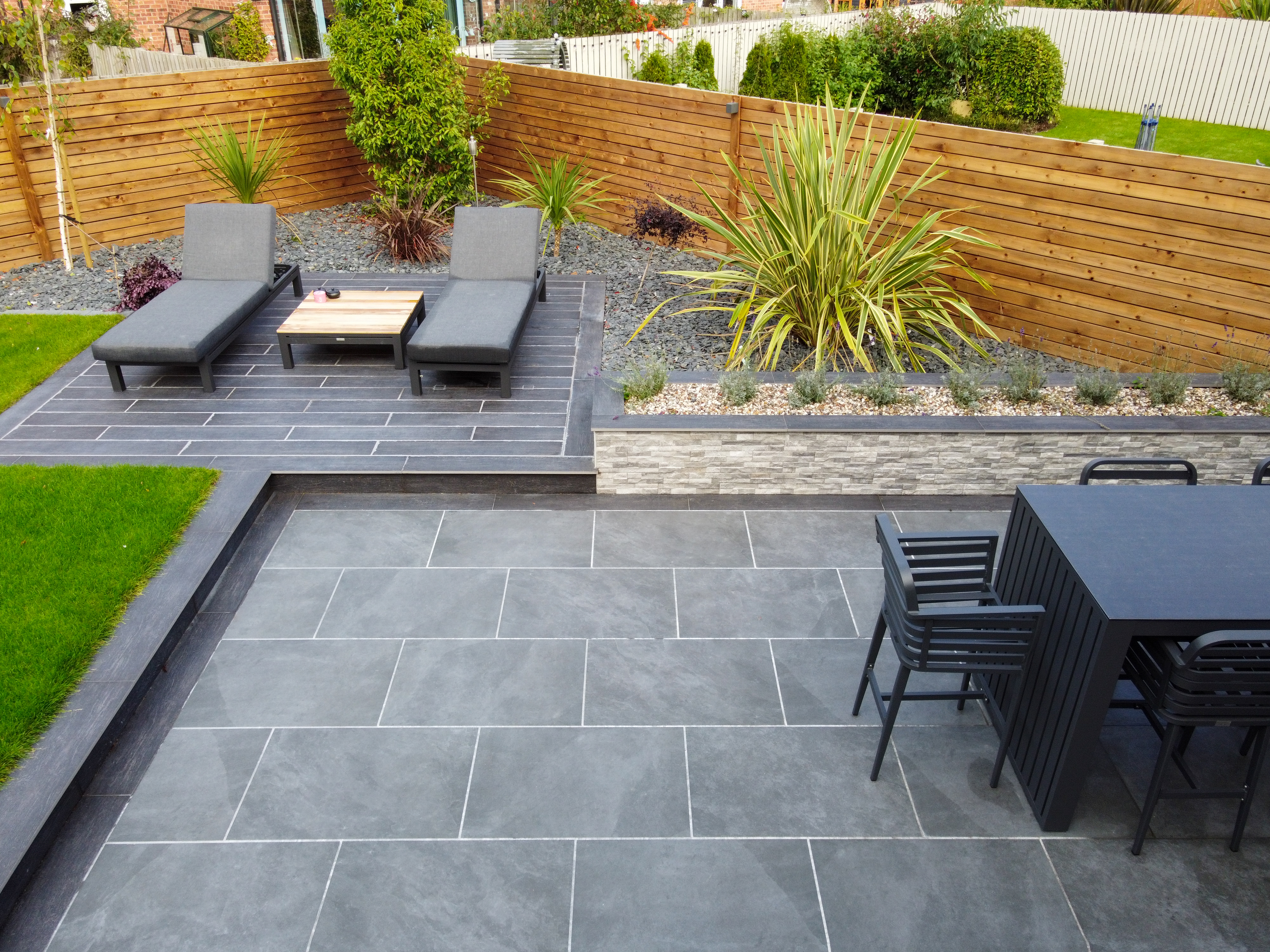 Beautiful black slate floor with asymmetrical blocks Stock Photo