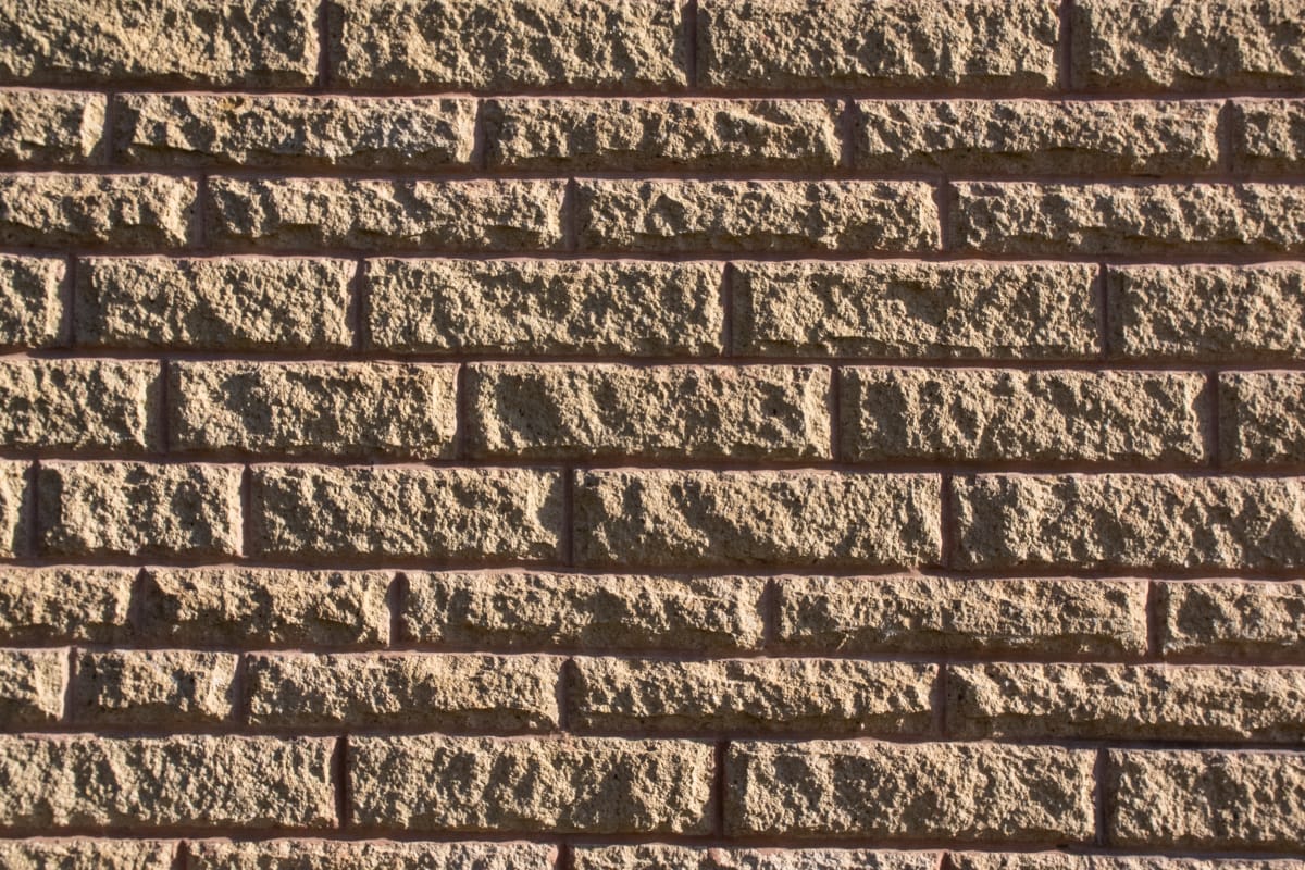 cromwell pitched walling in buff - landscape house