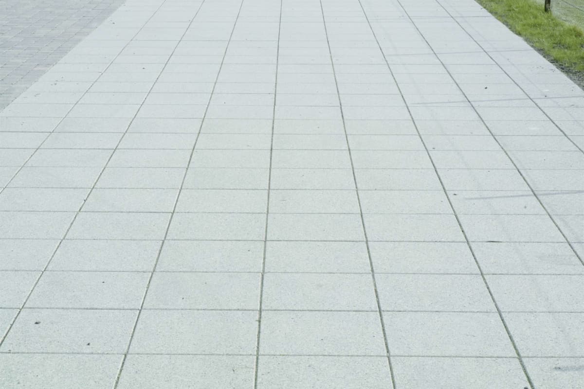 conservation - smooth ground silver grey and tegula - cobbles pennant grey dundee