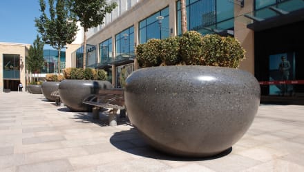 Large protective planters on street