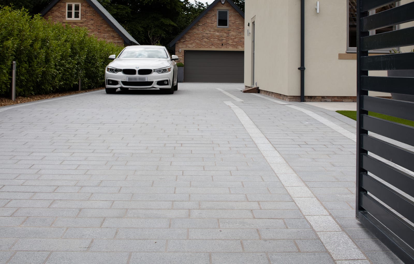 Sawn Granite Setts in Dark and Light driveway