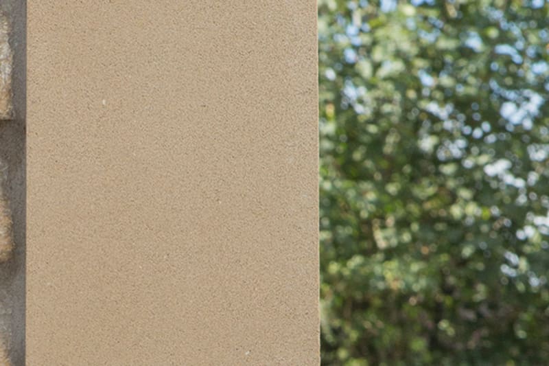 Semi-dry and fibre reinforced cast stone