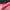 Red tanking membrane laid on gravel.