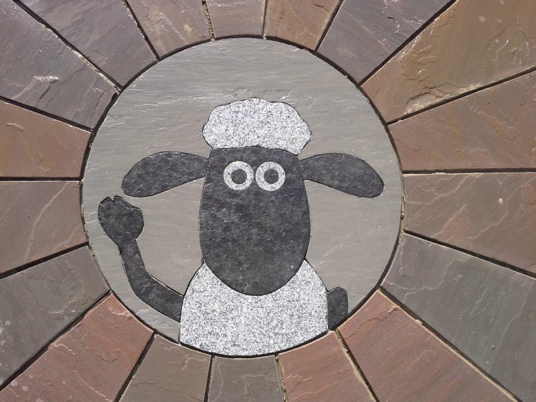 Shaun the Sheep engraved on paving.