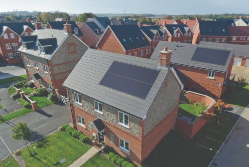 A bird's eye view of a house with a well-maintained roof