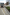 Titan grey kerb at roadside next to a lorry.