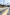 Grey combined kerb and drainage system next to roadside.