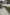 White lorry parked next to a high grey kerb.
