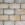 Marshalls split and tumbled Natural Stone Setts in Autumn Bronze.