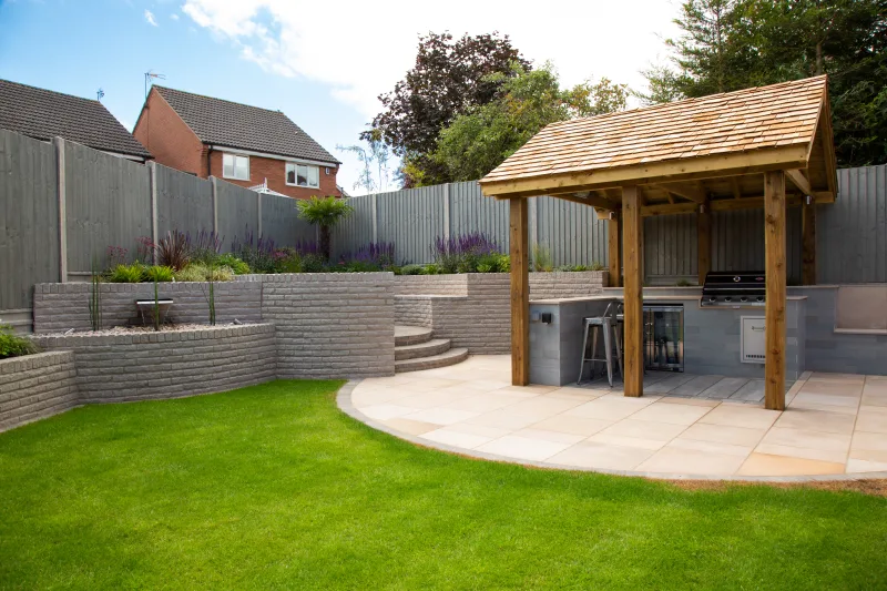 Outdoor kitchen with wooden canopy